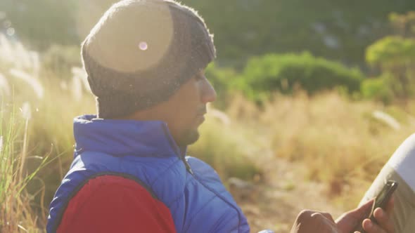 Sporty mixed race man with prosthetic leg enjoy his hike