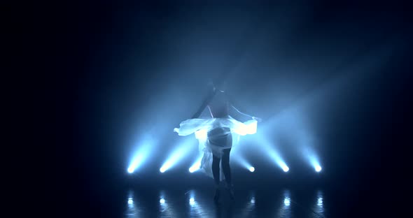 The Camera Captures the Ballerina Whirls on Stage