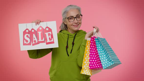 Elderly Granny Woman Showing Sale Inscription Banner Text Advertising Discounts Low Holidays Prices