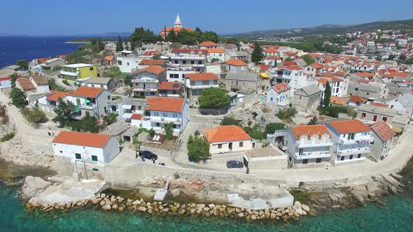 Aerial view of traditional dalmatian town with church in the middle, Croatia