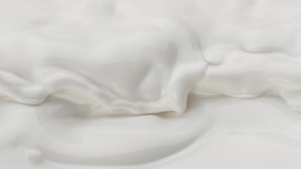 Super Slow Motion Detail Shot of Waving Fresh Cream at 1000 Fps