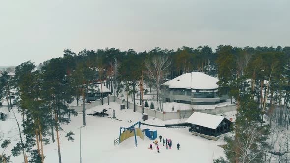 Hotel Among Old Pines at Resort with Ski Tracks Aerial View