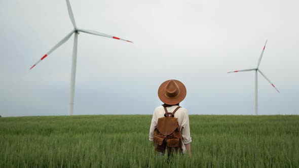 Attractive girl with a retro camera with alternative energy generation