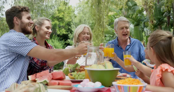 Happy family toasting together