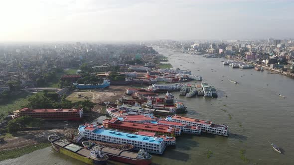 Aerial over the Buriganga River and shocking illegal dockyards - Bangladesh