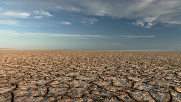 Dynamic Shot of Cracked Soil Ground of Dried Lake or River