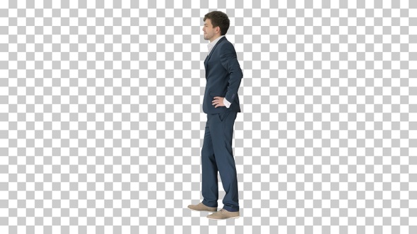 Handsome young businessman standing arms, Alpha Channel