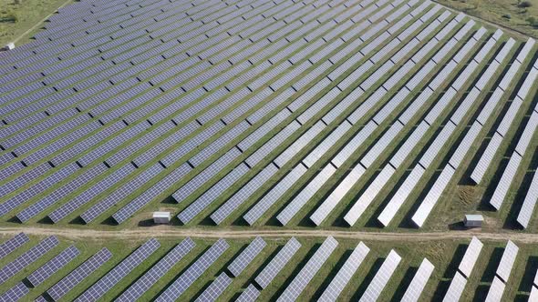 aerial view of solar power station, Aerial Top View of Solar Farm with Sunlight, Renewable Energy