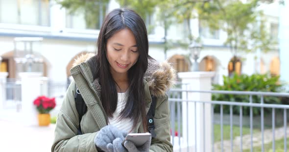 Woman use of mobile phone