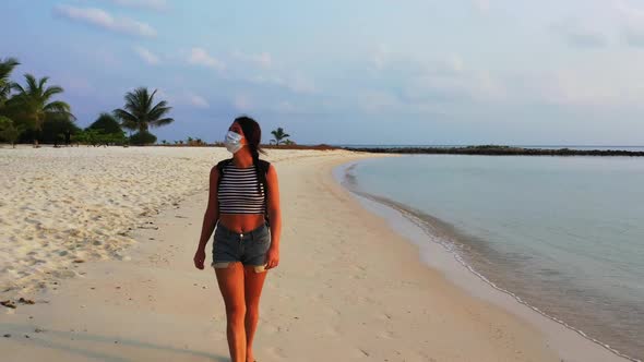 Women tanning on beautiful bay beach time by transparent ocean with white sandy background of Koh Ph