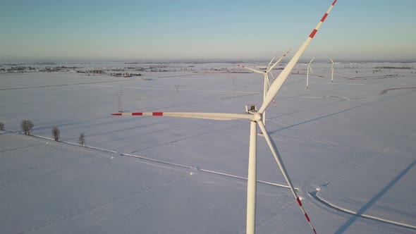 Drone View From The Height Of Wind Turbine Producing Renewable Energy At The Wind Farm In Poland On