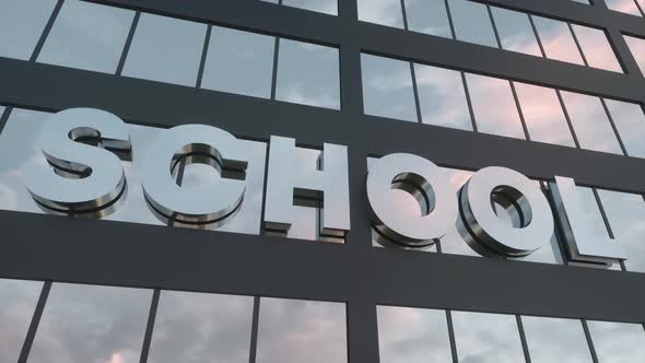 School Sign on a Modern Glass Skyscraper