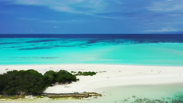 Luxury flying island view of a sunshine white sandy paradise beach and aqua turquoise water background