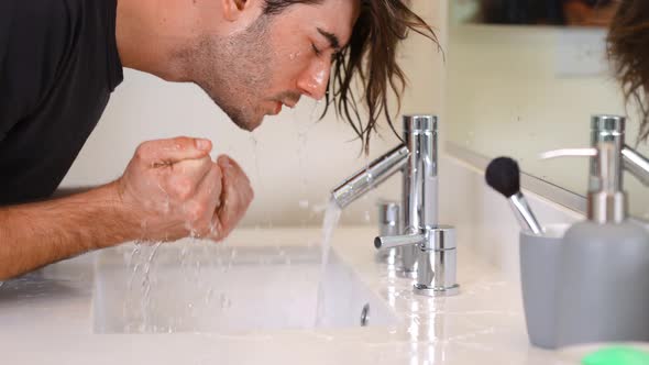 Man Washing Face Slow Motion