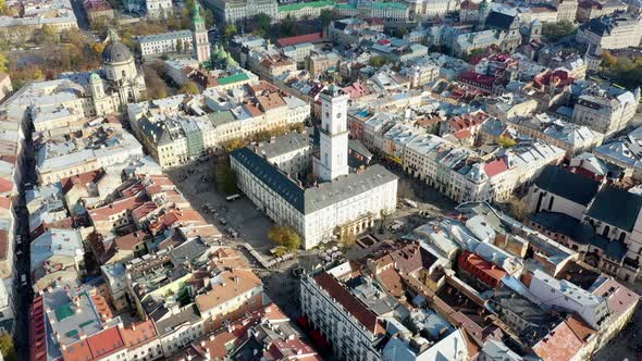 Aerial Drone Video of Lviv Old City Center - Roofs and Streets, City Hall Ratusha