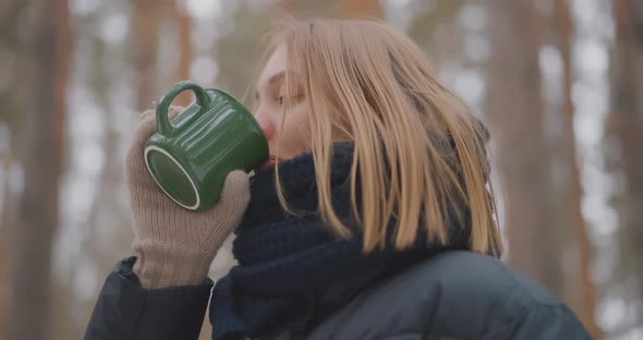 Woman is drinking tea outdoor LGBTQ Gay Lesbian Bisexual Transgender Lesbian concept Love