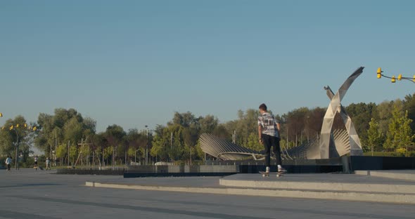 Young Man Is Failing a Kickflip, Skateboarding Training, 