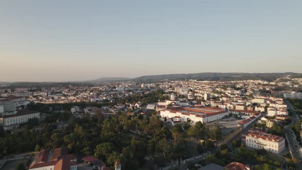 Aerial flying towards Coimbra Prision establishment Building, Cityscape Horizon