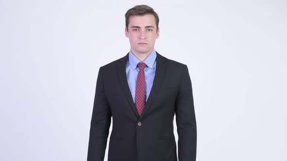 Young Handsome Businessman Wearing Suit