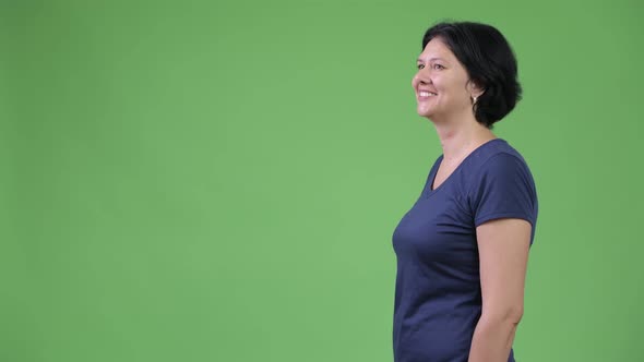 Profile View of Beautiful Woman with Short Hair Smiling