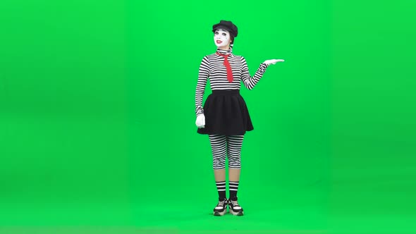 Mime Acting Like Something in Hands