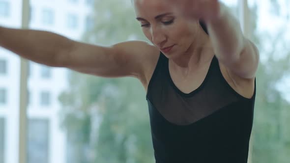 Close-up of Confident Smiling Woman Doing Breathing Exercise. Portrait of Young Beautiful Caucasian