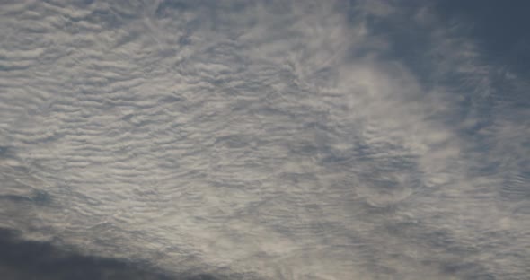 White Clouds Move Quickly Across The Sky