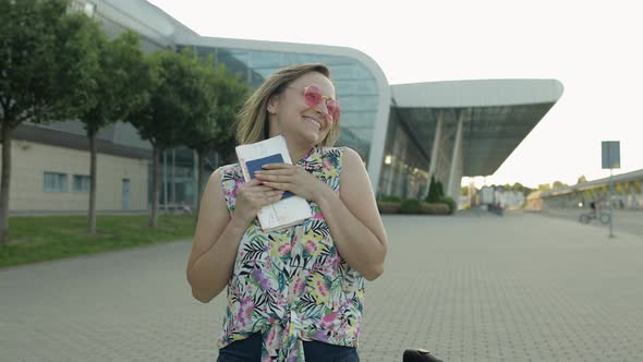 Woman Tourist Walking with Luggage From Airport, Girl Stops and Start Smiling, Rejoices, Vacation