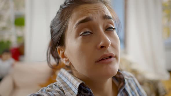 Pov Shot of Young Woman Having Video Call with Kids Playing on Blurred Background