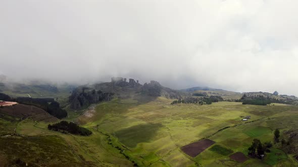 Foggy Sky Over Massive Rock Pillars With Verdant Landscape In Cumbe Mayo Near Cajamarca City, Northe