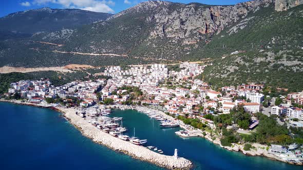 The top view from the drone of Kas resorts, bay, yahts, city in Mugla in Turkey