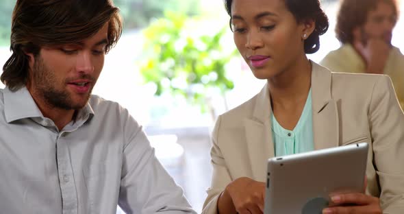 Businesspeople interacting while in a meeting