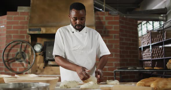 Animation of african american male baker preparing sourdough for bread