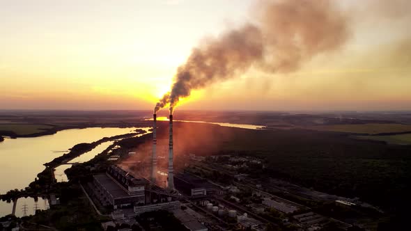 Aerial View on a Huge Industrial Factory Among Nature