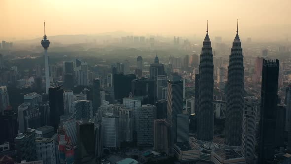 Kuala Lumpur city skyline on sunset in Malaysia.