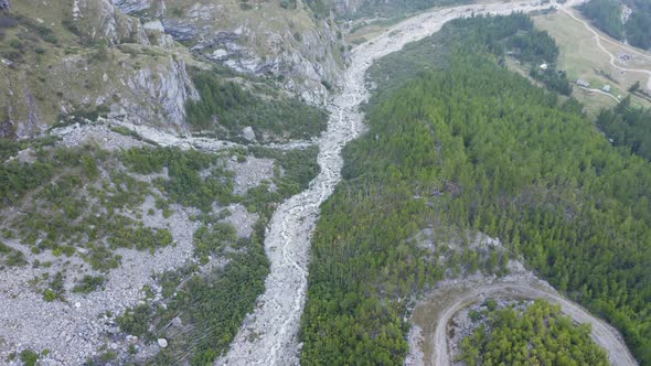 Aerial View of Belvedere Valley Glacier Melt Creating Rivers and Discovering Rocks