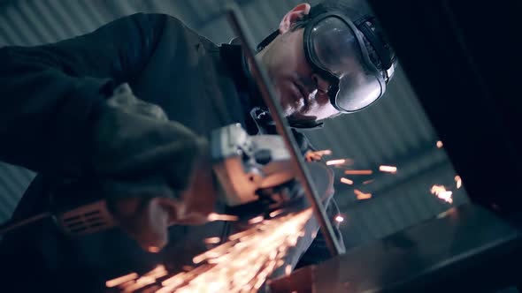 Metal Cutting Carried Out By a Male Welder