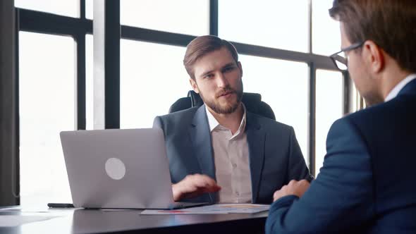 Handshake of boss and subordinate after successful job interview