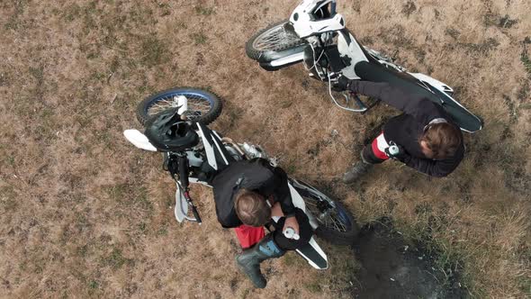 Aerial Shot of Motorcyclists Having Conversation Outdoors