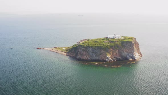 Drone View of the Rocky Skriplev Island in the Middle of the Sea