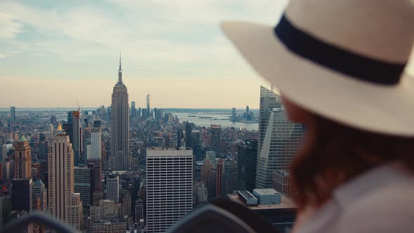 Young tourist on the roof of a skyscraper