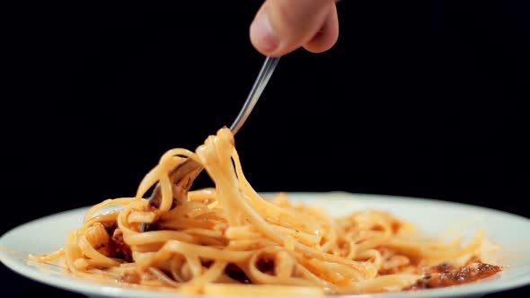 Man Eat Pasta Italian With Sauce Bolognese. Spaghetti, Tomato And Parmesan. Italian Carbonara.