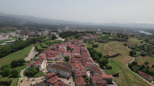 Aerial view of ancient fortress walls and village of Valença do Minho on sunny day. Border Portugal