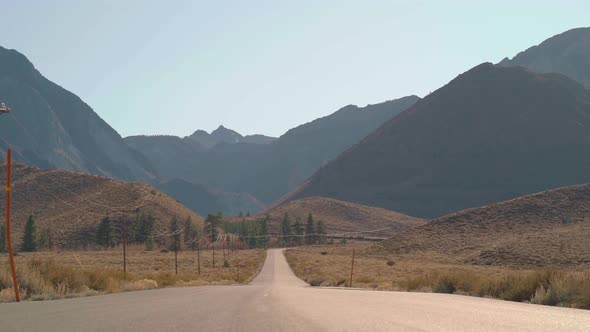 Static Shot Road Leading to Mountains Low Angle