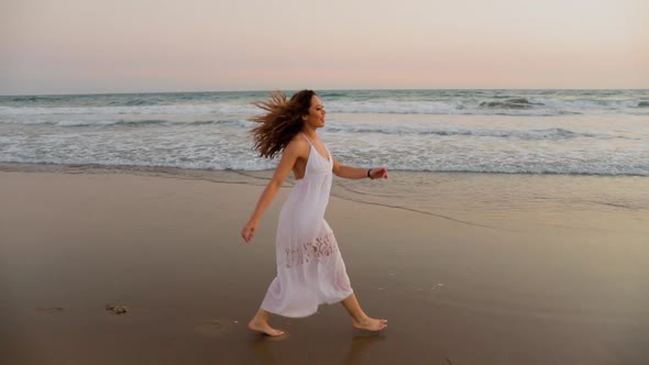 Beautiful Woman Enjoying The Beach