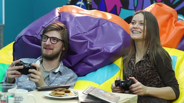 Young Couple on Date Playing Console, Video Game Addiction, Fun