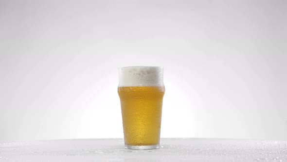 Glass of Beer Rotates 360 Degrees