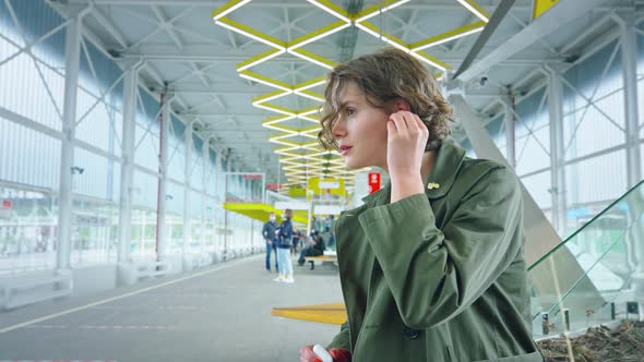 Young Woman Walk in Urban Space Listen to Music