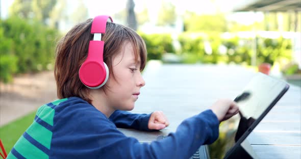 Boy Learns From A Distance