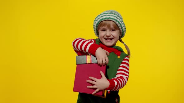 Kid Girl in Christmas Elf Santa Helper Costume Getting Receiving Present Gift Box